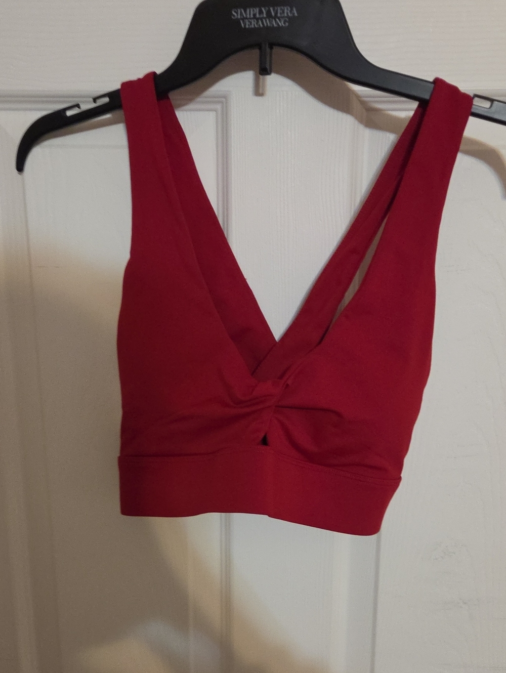 Fabletics Twist-Front V-Neck Sports Bralette in Crimson